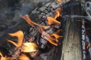 Drying Boots By Campfire