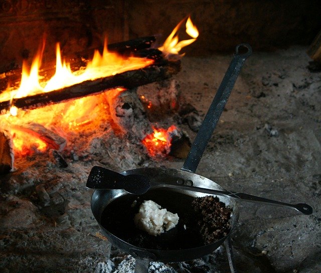 can you use a cast iron skillet over a campfire