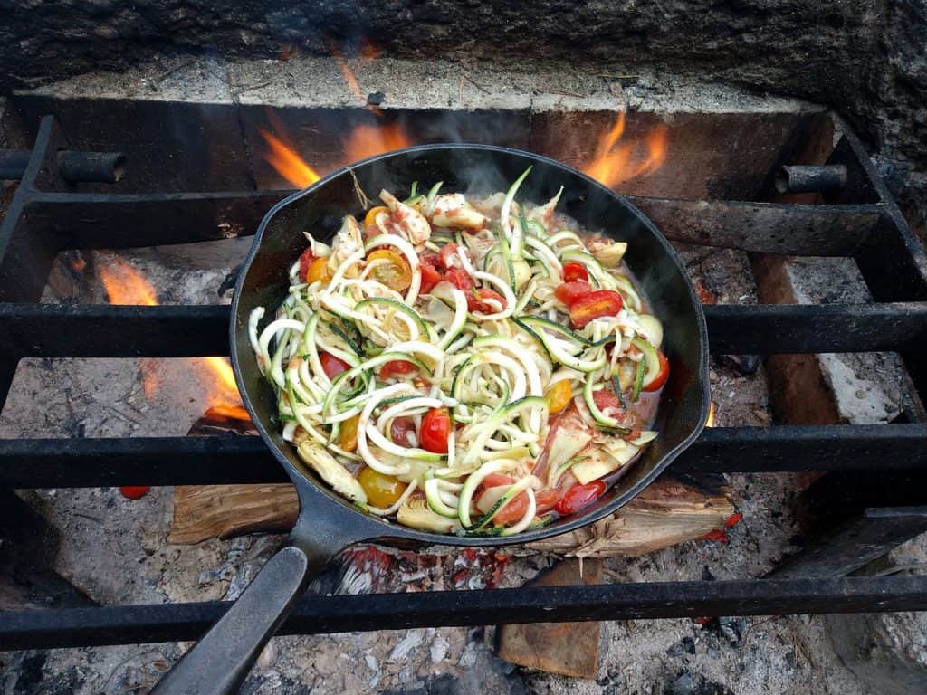 Cast Iron Skillet Over Campfire